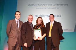 Helen Self and Graham Setter, Landmarc +people programme receive a Highly Commended award presented by Matthew Kershaw, Chief Executive, Salisbury NHS Foundation Trust and Carlton Brand, Director, Resources, Wiltshire Council