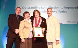 Beth Palmer, Neighbourhood Team Co-ordinator and colleague Maggie Grimshaw, Doug Jones, Chairman, Liquid Media and Andy Wright, 2009 winner